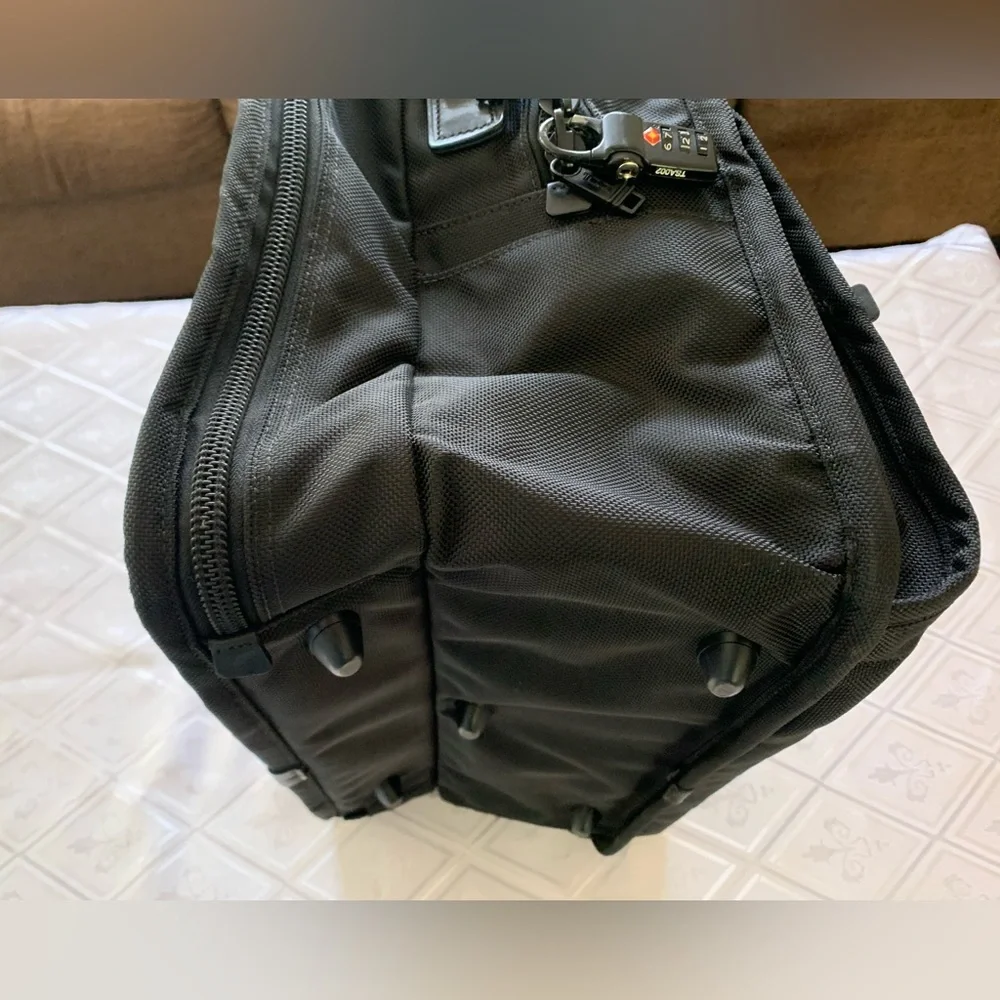 Tumi Black Travel Bag with Adjustable Strap